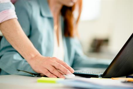 Close-up of a male manager sexually harassing a female colleague | Newkirk Zwagerman