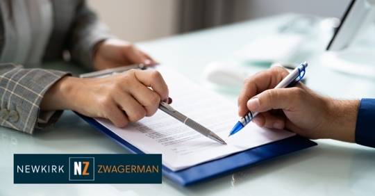 employee signing a contract